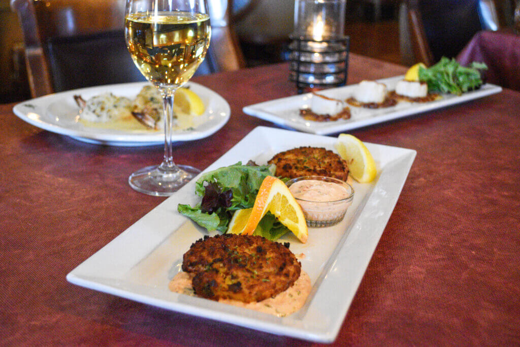 Sarento's happy hour crab cakes and riesling