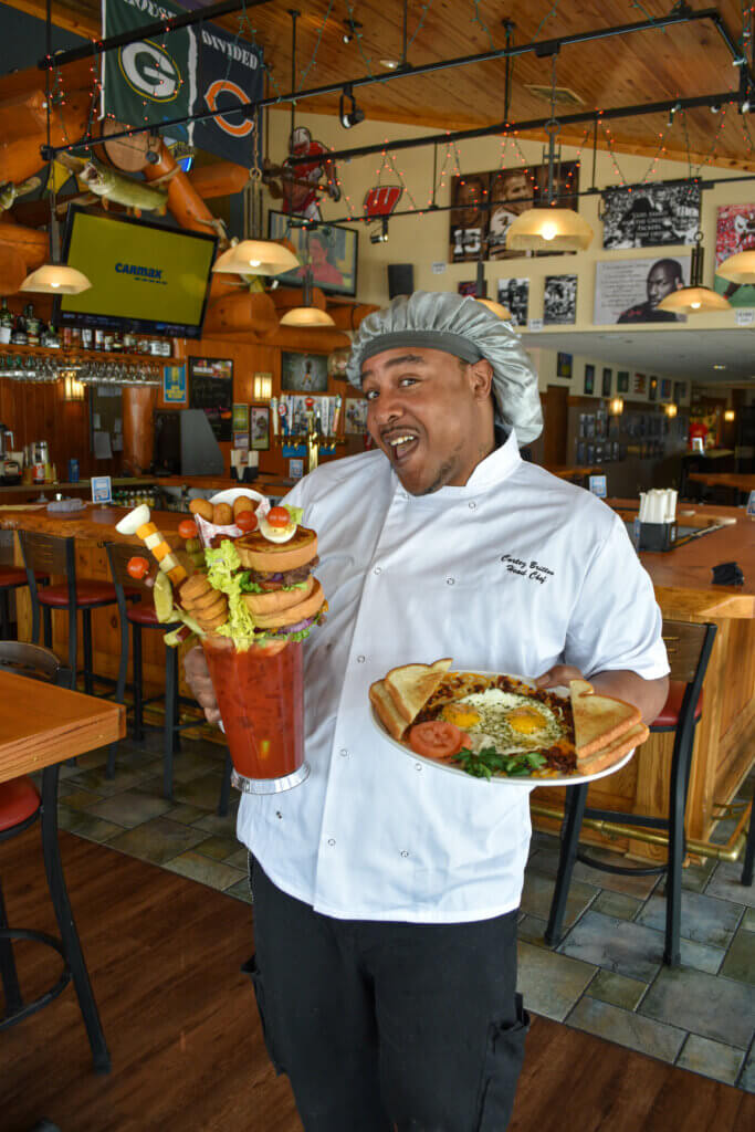 Chef Cortez with the Monster Bloody Mary and a breakfast platter