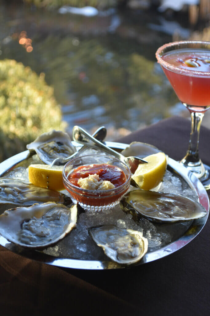 Del Bar Happy Hour Oysters and Pomegranate Martini