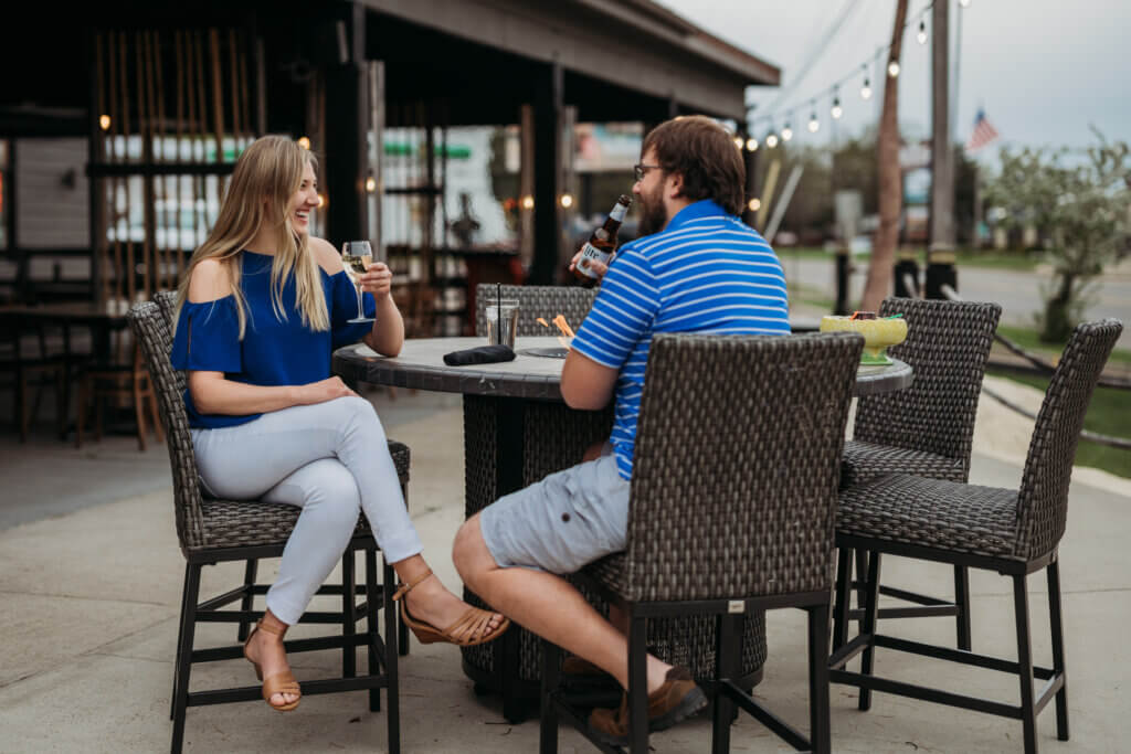 Couple on outdoor patio at Hot Rocks